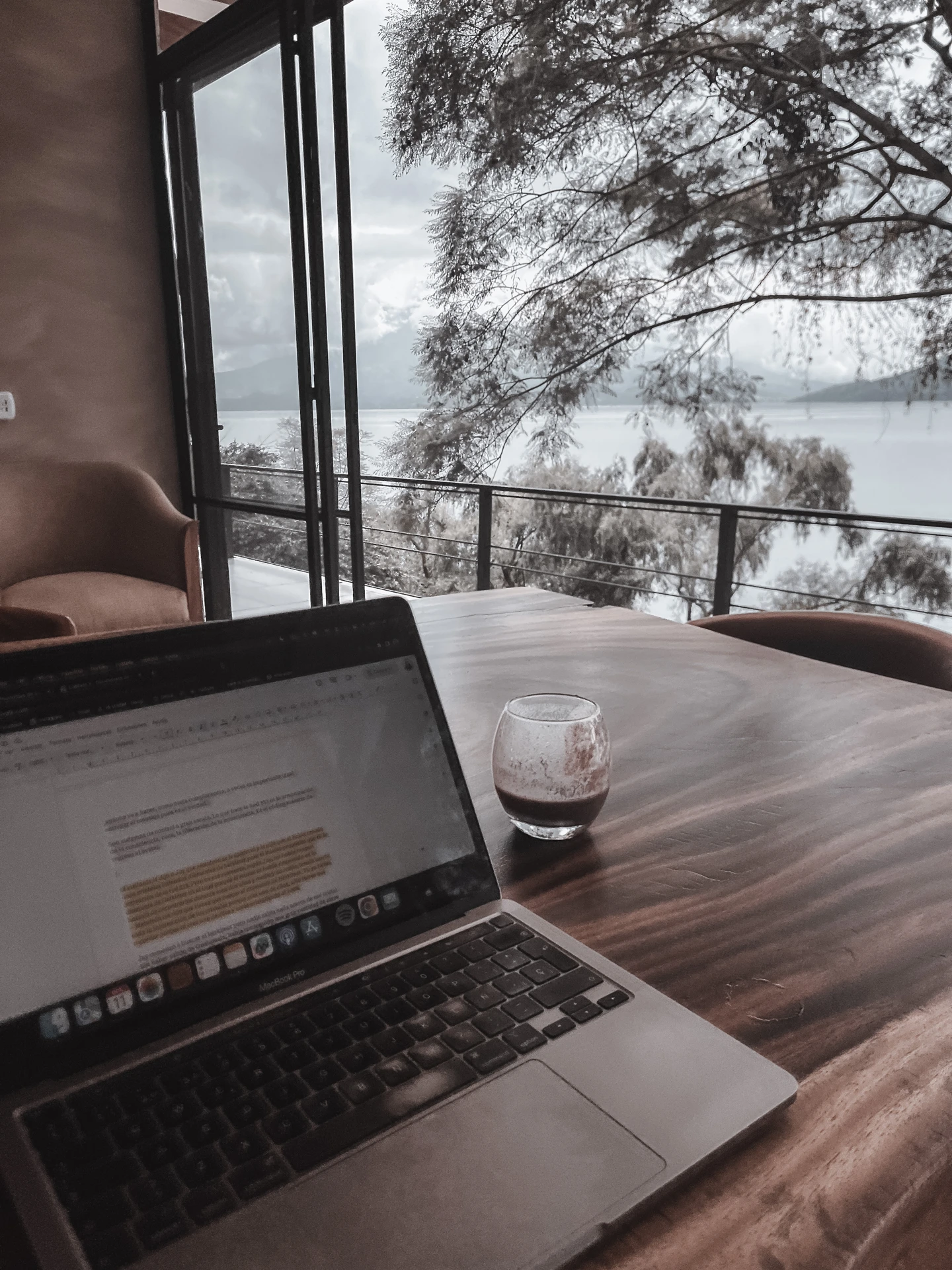 A laptop used for writing and planning author content.