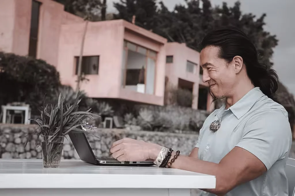 A person working through ideas on a laptop.